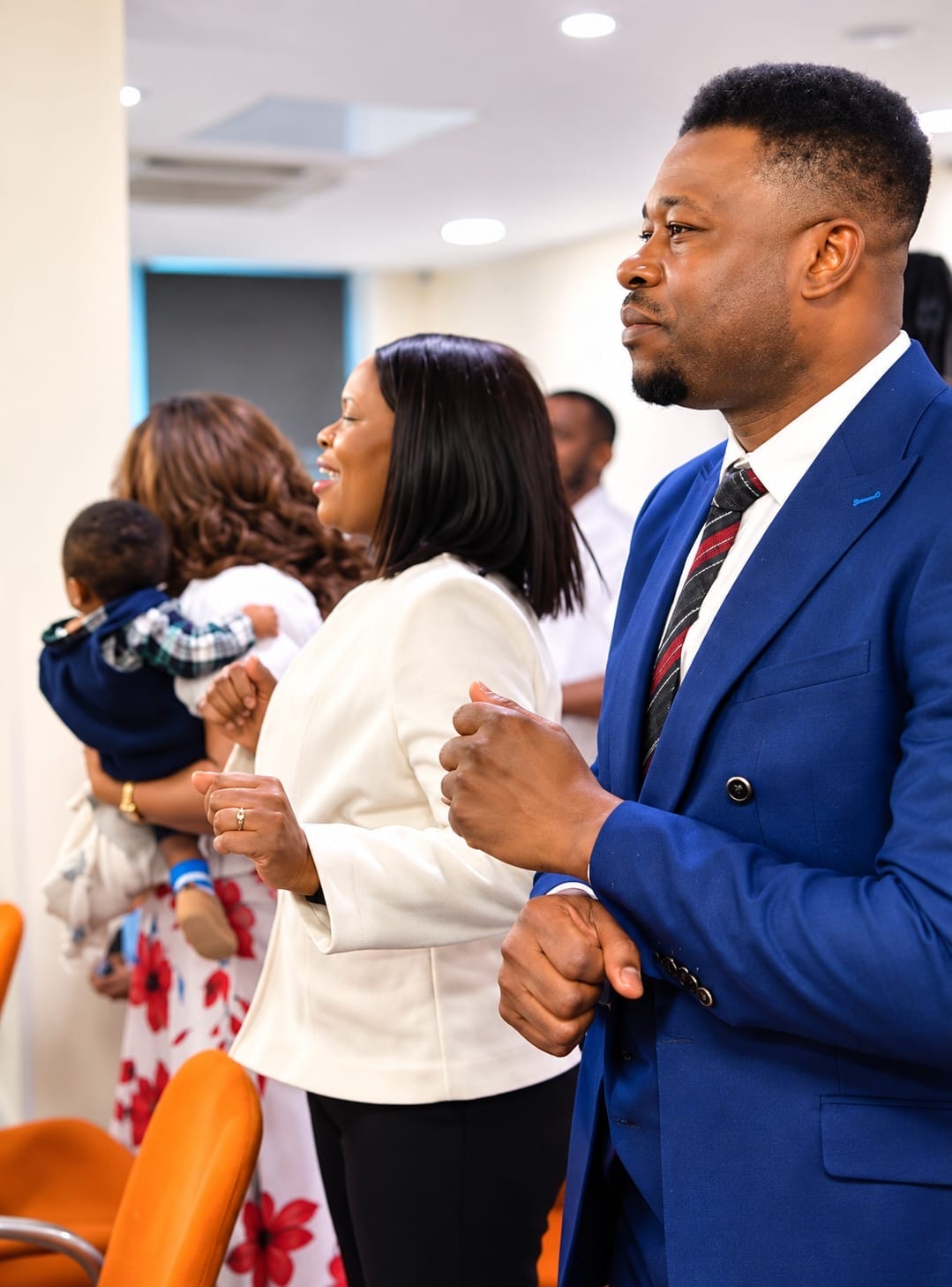 A family worshipping together at Dominion City Leeds